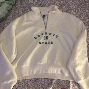 white cropped quarter zip
